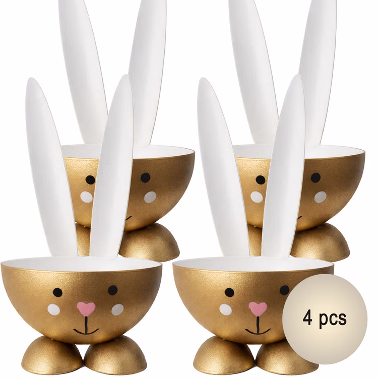 Eierbecher-Set 4 Stück Hase Gold aus Metall Osterhase gedeckter Tisch Ostern Oster-Deko Dekoration Frühling Osterfest Osterbrunch Tisch-Deko Vier goldfarbene Eierbecher in Hasenform aus Metall mit weißen Ohren und rosa Herz-Nase, frontal auf weißem Hintergrund angeordnet; rechts unten Hinweis 4 Stück.