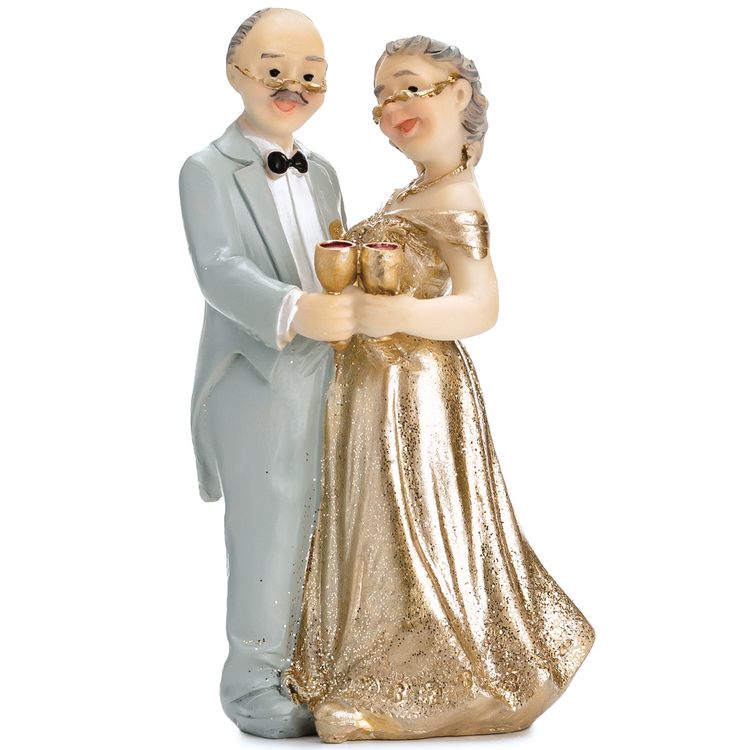 Tortenaufsatz Goldene Hochzeit Ehepaar Jubiläum Tisch-Deko Party-Zubehör Figur eines älteren Ehepaares als Tortenaufsatz zur goldenen Hochzeit, Mann im hellen Anzug und Frau im goldenen Kleid stoßen mit Sektgläsern an.