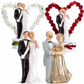 Übersicht verschiedener Tortenaufsätze mit Hochzeitspaaren und Rosenherzen in Weiß und Rot sowie Jubiläumsfigur für goldene Hochzeit.