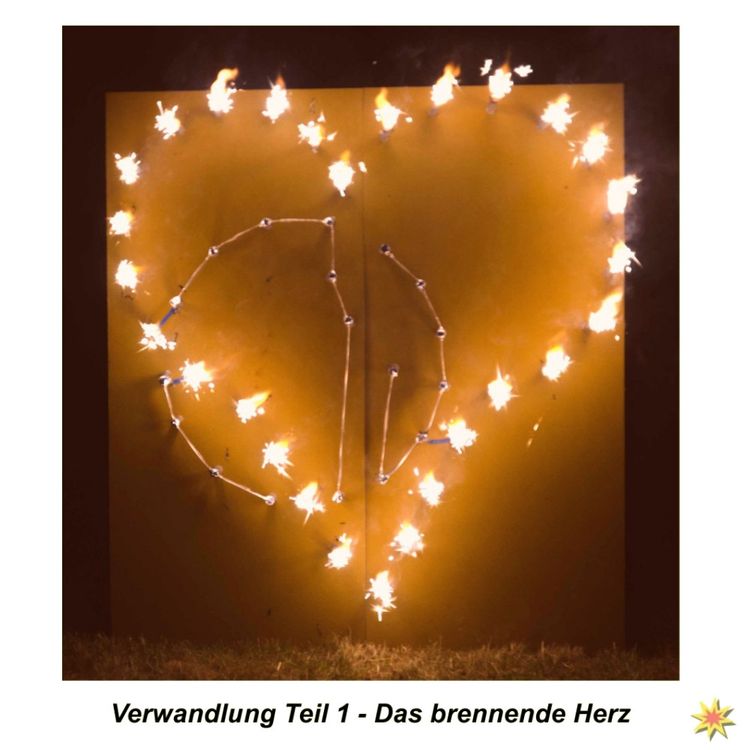 Lichterbild HERZ wird zu Ringen, Verwandlungsbild Lichterbild HERZ wird zu Ringen Hochzeit Heiratsantrag