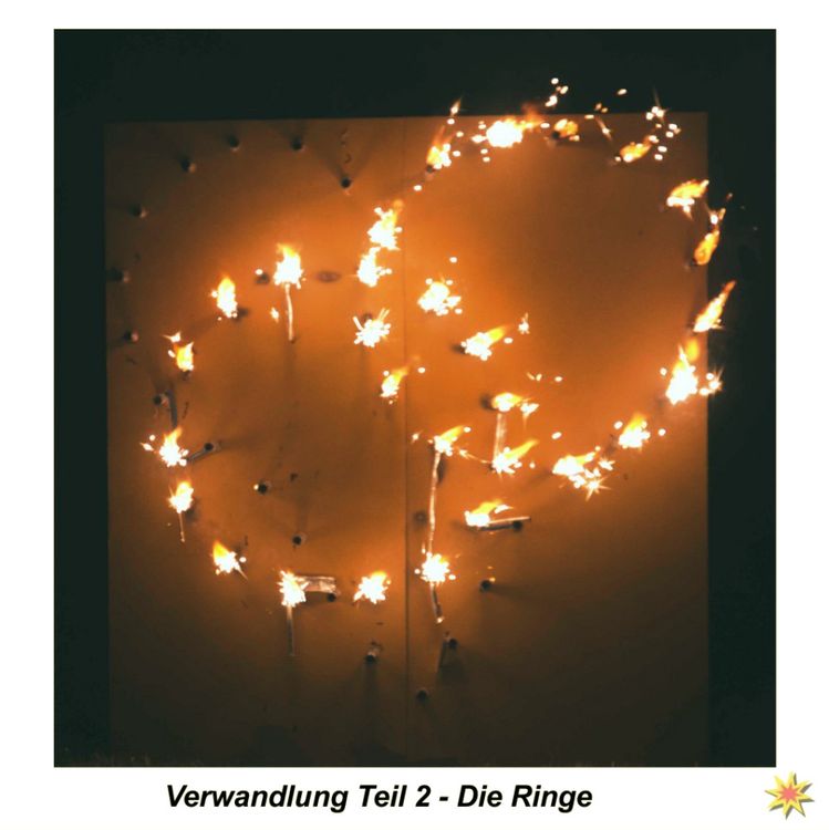 Lichterbild HERZ wird zu Ringen, Verwandlungsbild Lichterbild HERZ wird zu Ringen Hochzeit Heiratsantrag